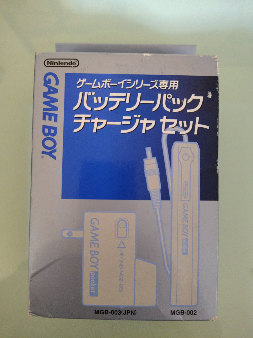 Nintendo GAMEBOY Battery Pack Charger MGB-002 MGB-003 Set ( nuovo)